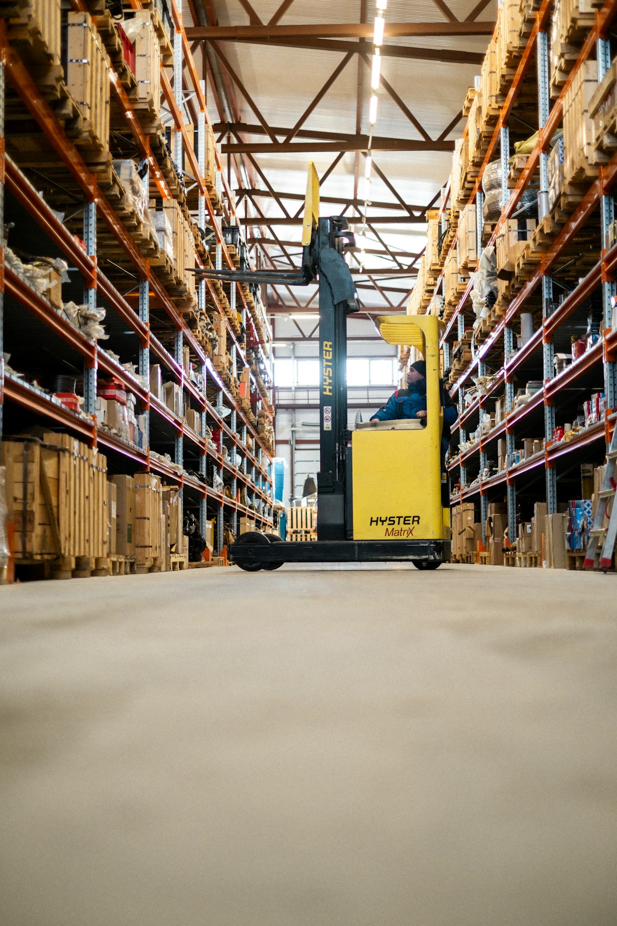 Logistics worker using mobile terminal for parcel scanning